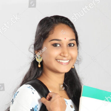 stock photo indian college girl holding books and backpack 1719234652 e1710751516232